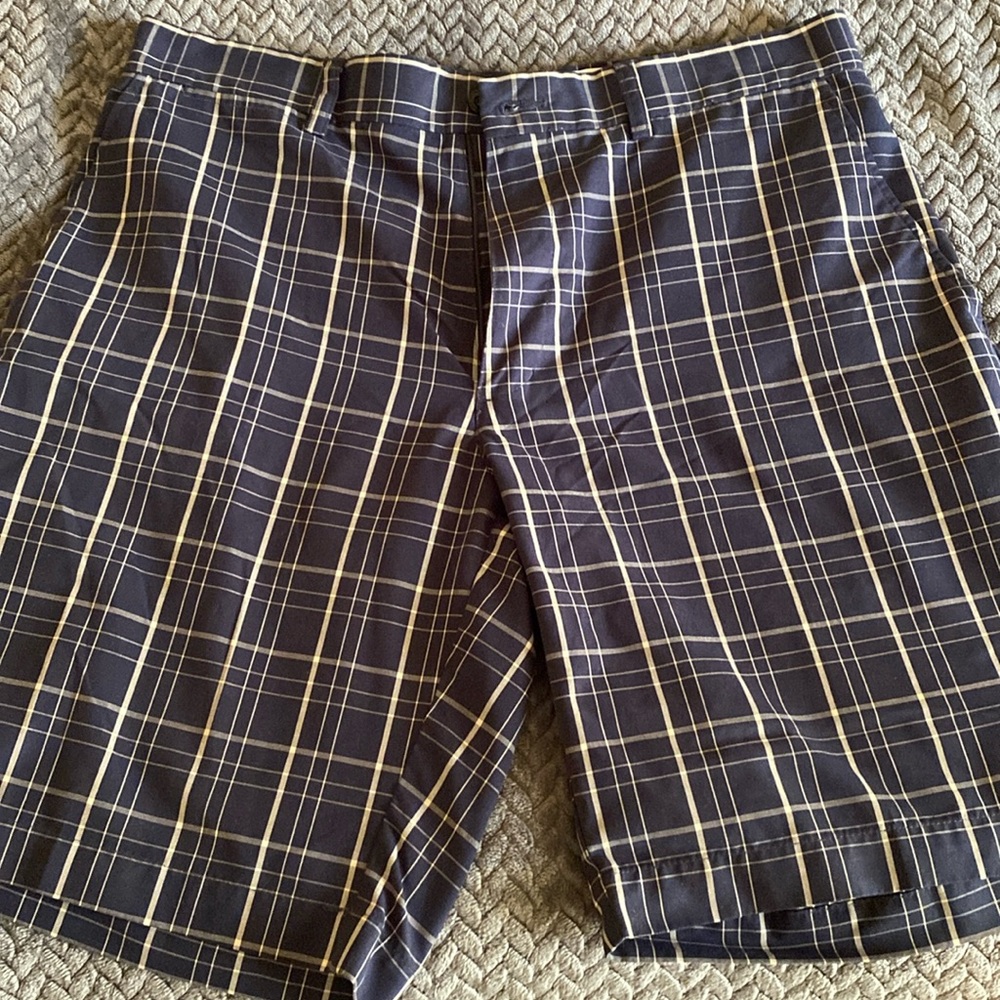 PGA Tour golf shorts size 32 in the waist navy blue with gray stripes